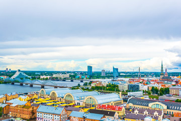 Aerial view of Riga including the Latvian national library and the zeppelin hangars from top of the academy of sciences building. © dudlajzov