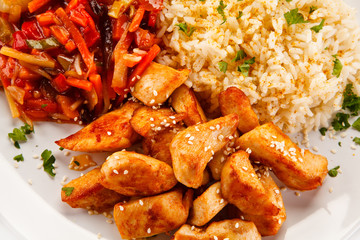 Chicken meat with rice and vegetables