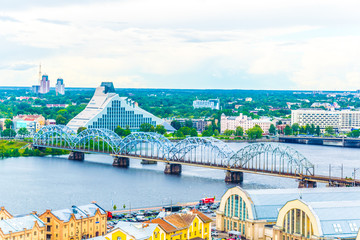 Aerial view of Riga including the Latvian national library and the zeppelin hangars from top of the academy of sciences building. © dudlajzov