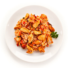 Chicken meat with rice on white background © Jacek Chabraszewski