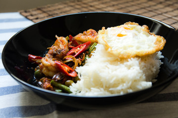 Stir fried prawn with red curry paste