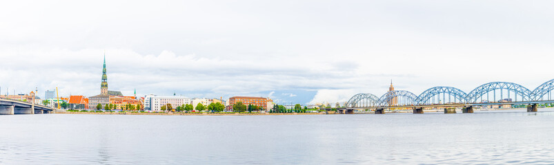 Panorama of riga including saint peters church, the zeppelin hangars and the academy of sciences © dudlajzov