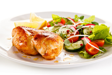 Grilled chicken fillet on white background