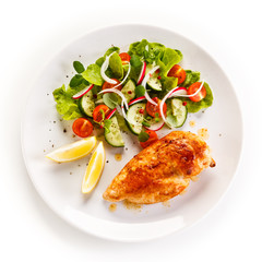 Grilled chicken fillet on white background