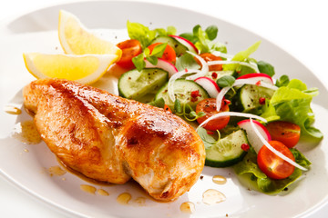 Grilled chicken fillet on white background