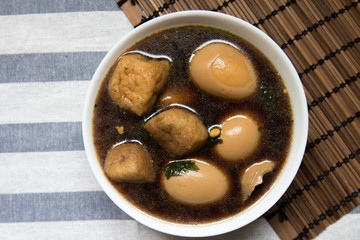 Eggs and tofu with sweet brown sauce