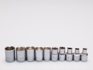 set of interchangeable heads for chrome socket wrench. Isolated on white background.