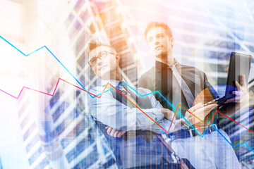 Businessman using digital laptop computer at Outside Office, Success and Happiness Team Concept.