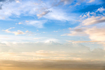 Obraz premium Dramatic sunset and sunrise sky with beautiful and colorful nice soft cloud background concept.