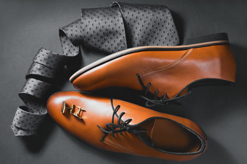 Man's style. Men's Accessories. Shoes with tie and cuff