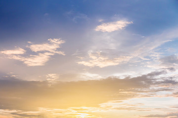 Dramatic sunset and sunrise sky with beautiful and colorful nice soft cloud background concept.