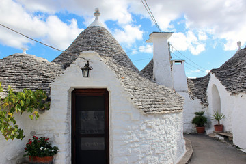 Street with trulli in Alberobello, Bari, Italy