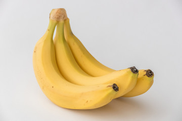 Bunch of bananas isolated on white background / Bunch of ripe yellow bananas isolated on white background