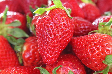 Strawberry background. Red whole strawberry as pattern texture. Strawberries. Sweet