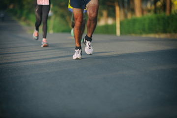 Fototapeta na wymiar Marathon running race, Run up the mountain road.