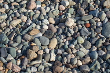 Nature background from gray sea pebbles, texture
