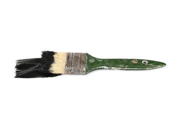 Old paint brush with black color isolated on white background