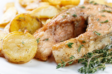 Roasted  salmon with  potatoes.
