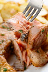 Roasted  salmon with  potatoes.