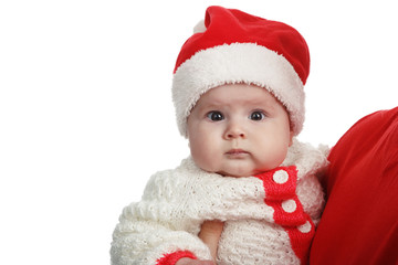 Beautiful child wear red and white Christmas Santa hat isolated on white background.