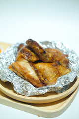 Roasted chicken food on aluminum foil