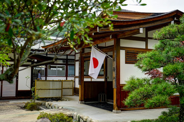 Japanese Traditional House with Flag