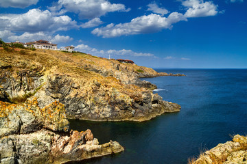 Coastal landscape - the rocky seashore with the village of Sozopolis, near city of Sozopol in Bulgaria