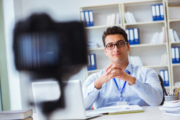 Business blogger doing webcast for his subscribers