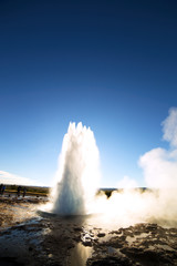 Strokkur Geysir Eruption against the Sun, Iceland