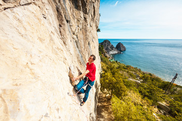 A rock climber on a rock.