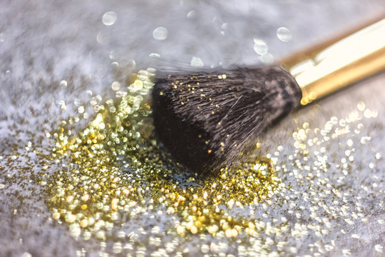 Texture Of Gold Glitter On The Makeup Brush