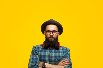 Hipster man with arms crossed
