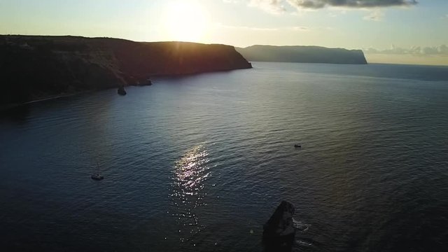 seascape. camera flies over the sea and rocks , video from the drone, flight over the sea