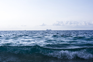 Waves crashing on a tropical beach