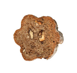 Piece of domestic, home-made bread with wholegrain and nuts, isolated