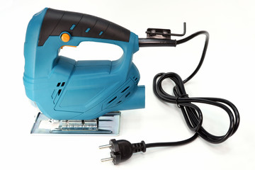 Electric jigsaw for cutting on white background. Professional cutting tool.