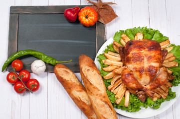 Homemade  roasted whole turkey on wooden table for Thanksgiving.