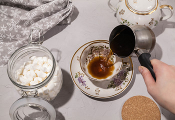 cup of coffee with marshmallow for breakfast