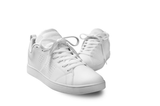 Pair of White sneaker isolated on white background with clipping path