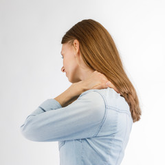 Woman massaging neck pain 