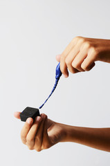 Magnetized elastic and viscous paste on child's hand