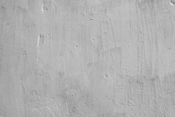 Wall fragment with scratches and cracks