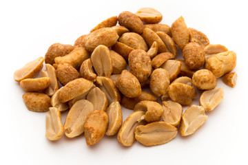 Peeled peanuts on the isolated background.