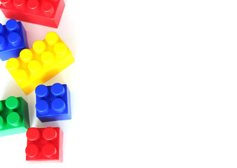 colored construction blocks on a white background