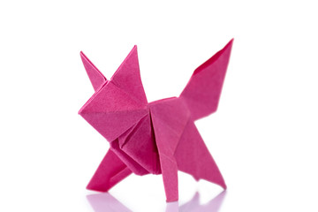 Paper fox model on white background. Fun project for origami beginners and kids. Art of folding paper design. - obrazy, fototapety, plakaty