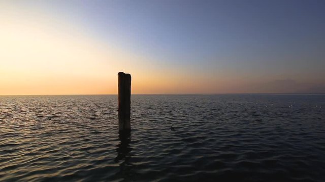 Sunset in lazise of lake garda. Sunset over the lake 