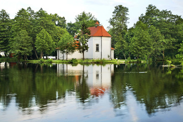Fototapeta na wymiar Church of St. John of Nepomuk on water in Zwierzyniec. Poland