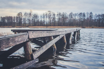 Wooden pier on the shore of the lake