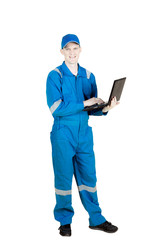 Caucasian mechanic holds laptop in the studio