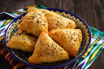 Puff pastries with meat (samosa) - traditional uzbek and indian pasrty. 